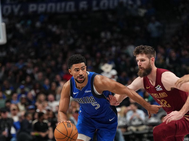 DALLAS, TX - JANUARY 03:  Quentin Grimes #5 of the Dallas Mavericks dribbles the ball during the game against the Cleveland Cavaliers on January 3, 2025 at American Airlines Center in Dallas, Texas. NOTE TO USER: User expressly acknowledges and agrees that, by downloading and or using this photograph, User is consenting to the terms and conditions of the Getty Images License Agreement. Mandatory Copyright Notice: Copyright 2025 NBAE (Photo by Glenn James/NBAE via Getty Images)