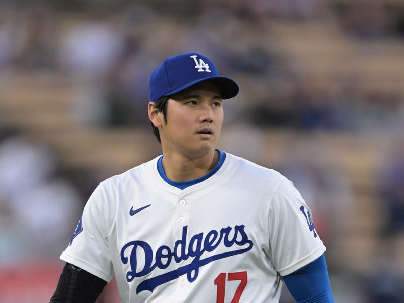 Apr 2, 2024; Los Angeles, California, USA;  Los Angeles Dodgers designated hitter Shohei Ohtani (17) warms up prior to the game against the San Francisco Giants at Dodger Stadium. Mandatory Credit: Jayne Kamin-Oncea-USA TODAY Sports