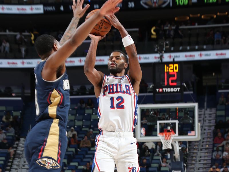 NEW ORLEANS, LA - MARCH 24:  Jared Butler #12 of the Philadelphia 76ers shoots the ball during the game against the New Orleans Pelicans on March 24, 2025 at the Smoothie King Center in New Orleans, Louisiana. NOTE TO USER: User expressly acknowledges and agrees that, by downloading and or using this Photograph, user is consenting to the terms and conditions of the Getty Images License Agreement. Mandatory Copyright Notice: Copyright 2025 NBAE (Photo by Layne Murdoch Jr./NBAE via Getty Images)