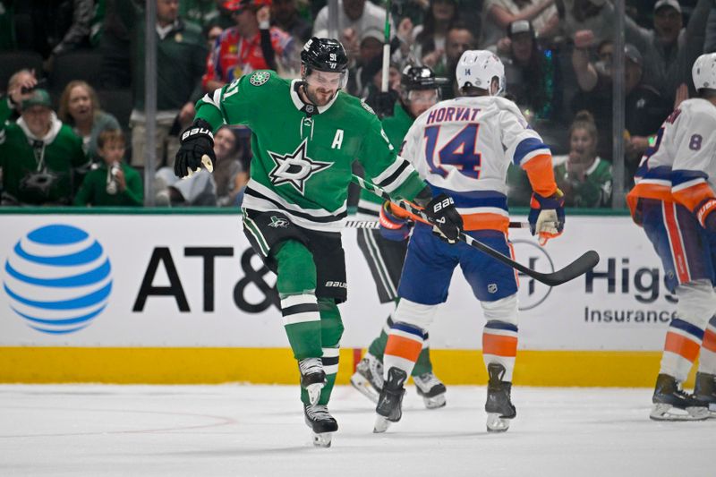 Oct 12, 2024; Dallas, Texas, USA; Dallas Stars center Tyler Seguin (91) celebrates after he scores a goal against the New York Islanders during the first period at the American Airlines Center. Mandatory Credit: Jerome Miron-Imagn Images