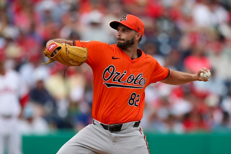 Mar 5, 2024; Clearwater, Florida, USA;  Baltimore Orioles pitcher Andrew Suarez (82) throws a pitch against the Philadelphia Phillies in the fifth inning at BayCare Ballpark. Mandatory Credit: Nathan Ray Seebeck-USA TODAY Sports