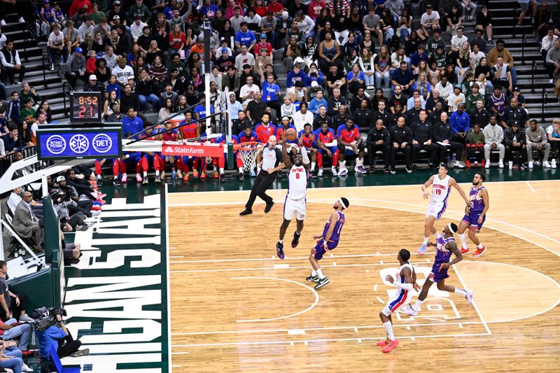 EAST LANSING, MI - OCTOBER 8: Jalen Duren #0 of the Detroit Pistons dunks the ball during the game against the Phoenix Suns during a NBA Preseason game on October 8, 2024 at the Breslin Center in East Lansing, Michigan. NOTE TO USER: User expressly acknowledges and agrees that, by downloading and/or using this photograph, User is consenting to the terms and conditions of the Getty Images License Agreement. Mandatory Copyright Notice: Copyright 2024 NBAE (Photo by Chris Schwegler/NBAE via Getty Images)