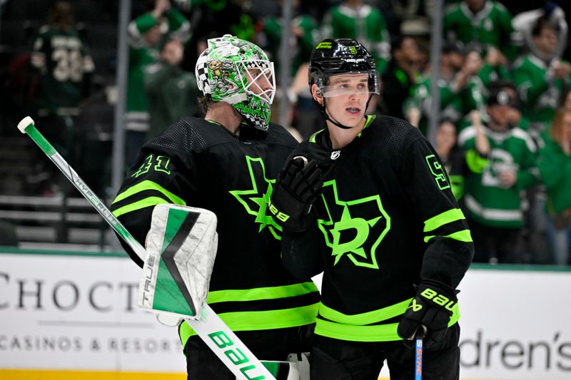 Jan 10, 2024; Dallas, Texas, USA; Dallas Stars goaltender Scott Wedgewood (41) hugs defenseman Nils Lundkvist (5) after the Stars defeat the Minnesota Wild at the American Airlines Center. Mandatory Credit: Jerome Miron-USA TODAY Sports