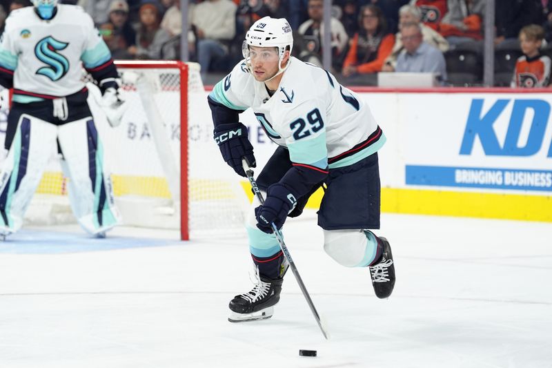 Oct 20, 2025; Philadelphia, Pennsylvania, USA; Seattle Kraken defenseman Vince Dunn (29) controls the puck against the Philadelphia Flyers in the second period at Xfinity Mobile Arena. Mandatory Credit: Kyle Ross-Imagn Images