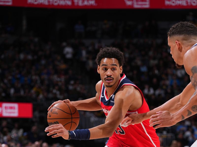 DENVER, CO - FEBRUARY 22: Jordan Poole #13 of the Washington Wizards drives to the basket during the game against the Denver Nuggets on February 22, 2024 at the Ball Arena in Denver, Colorado. NOTE TO USER: User expressly acknowledges and agrees that, by downloading and/or using this Photograph, user is consenting to the terms and conditions of the Getty Images License Agreement. Mandatory Copyright Notice: Copyright 2024 NBAE (Photo by Bart Young/NBAE via Getty Images)