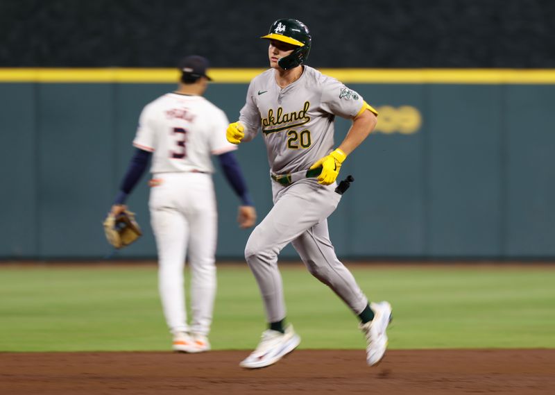 Sep 10, 2024; Houston, Texas, USA; Oakland Athletics second baseman Zack Gelof (20) rounds the bases after hitting a home run against the Houston Astros  in the second inning at Minute Maid Park. Mandatory Credit: Thomas Shea-Imagn Images