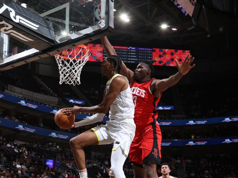 SALT LAKE CITY, UT - OCTOBER 7: Cody Williams #5 of the Utah Jazz drives to the basket during the game against the Houston Rockets during a NBA preseason game on October 7, 2024 at the Delta Center in Salt Lake City, Utah. NOTE TO USER: User expressly acknowledges and agrees that, by downloading and or using this Photograph, User is consenting to the terms and conditions of the Getty Images License Agreement. Mandatory Copyright Notice: Copyright 2024 NBAE (Photo by Melissa Majchrzak/NBAE via Getty Images)