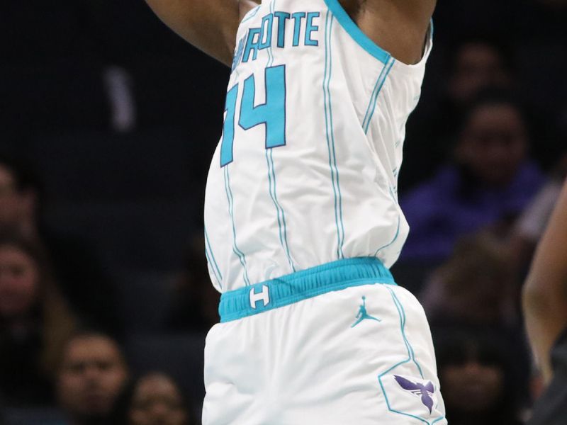 CHARLOTTE, NC - JANUARY 29: Moussa Diabate #14 of the Charlotte Hornets grabs the rebound during the game against the Brooklyn Nets on January 29, 2025 at Spectrum Center in Charlotte, North Carolina. NOTE TO USER: User expressly acknowledges and agrees that, by downloading and or using this photograph, User is consenting to the terms and conditions of the Getty Images License Agreement. Mandatory Copyright Notice: Copyright 2025 NBAE (Photo by Brock Williams-Smith/NBAE via Getty Images)