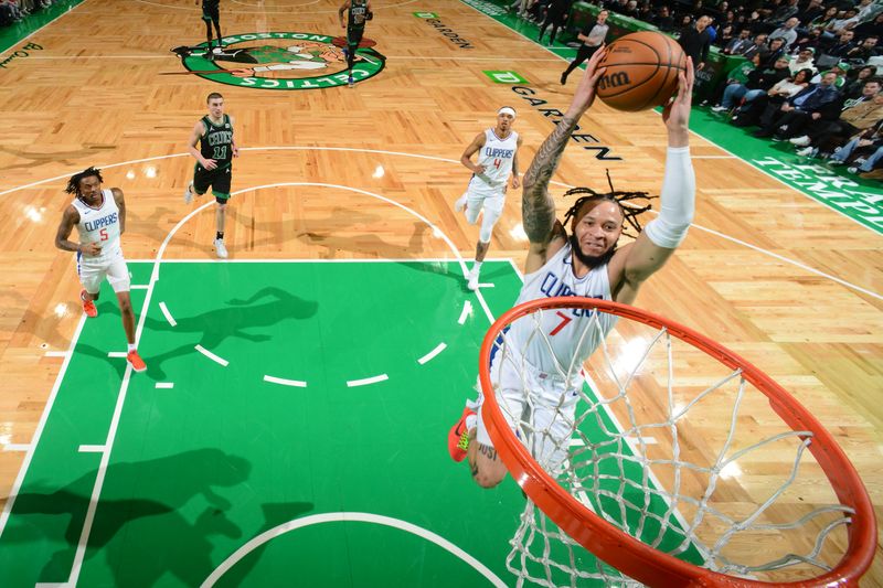 BOSTON, MA - JANUARY 27: Amir Coffey #7 of the LA Clippers drives to the basket during the game against the Boston Celtics on January 27, 2024 at the TD Garden in Boston, Massachusetts. NOTE TO USER: User expressly acknowledges and agrees that, by downloading and or using this photograph, User is consenting to the terms and conditions of the Getty Images License Agreement. Mandatory Copyright Notice: Copyright 2024 NBAE  (Photo by Brian Babineau/NBAE via Getty Images)