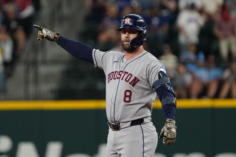 May 17, 2025; Arlington, Texas, USA; Houston Astros first baseman Christian Walker (8) reacts towards the dugout after hitting an RBI double during the first inning against the Texas Rangers at Globe Life Field. Mandatory Credit: Raymond Carlin III-Imagn Images