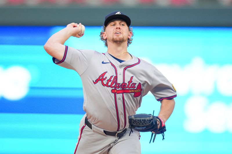 Aug 27, 2024; Minneapolis, Minnesota, USA; Atlanta Braves pitcher Spencer Schwellenbach (56) pitches against the Minnesota Twins in the first inning at Target Field. Mandatory Credit: Brad Rempel-USA TODAY Sports