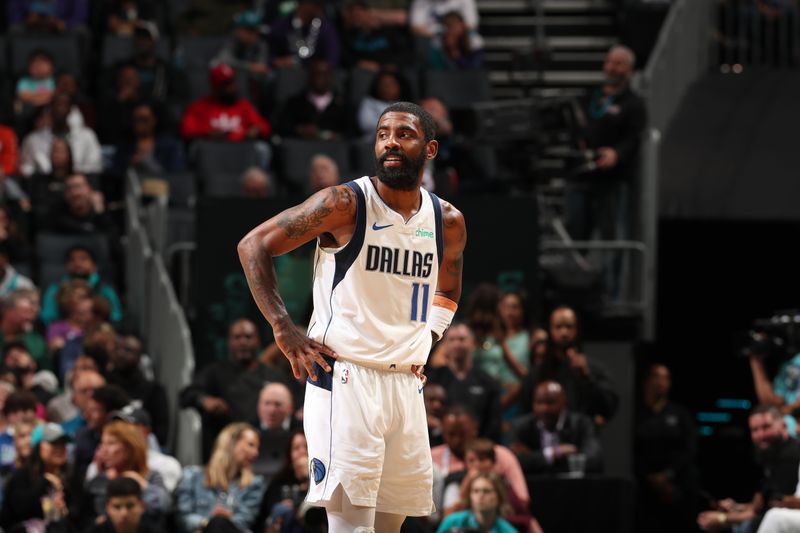 CHARLOTTE, NC - APRIL 9: Kyrie Irving #11 of the Dallas Mavericks looks on during the game against the Charlotte Hornets on April 9, 2024 at Spectrum Center in Charlotte, North Carolina. NOTE TO USER: User expressly acknowledges and agrees that, by downloading and or using this photograph, User is consenting to the terms and conditions of the Getty Images License Agreement. Mandatory Copyright Notice: Copyright 2024 NBAE (Photo by Kent Smith/NBAE via Getty Images)