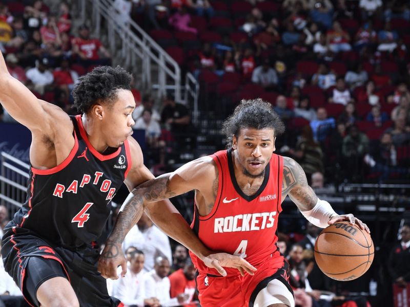 HOUSTON, TX - FEBRUARY 9: Jalen Green #4 of the Houston Rockets handles the ball during the game against the Toronto Raptors on February 9, 2025 at the Toyota Center in Houston, Texas. NOTE TO USER: User expressly acknowledges and agrees that, by downloading and or using this photograph, User is consenting to the terms and conditions of the Getty Images License Agreement. Mandatory Copyright Notice: Copyright 2025 NBAE (Photo by Logan Riely/NBAE via Getty Images)