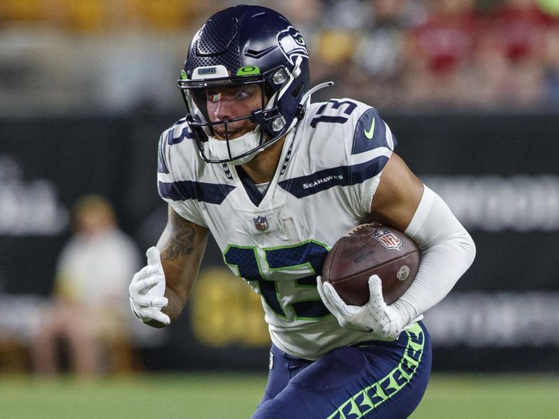 Seattle Seahawks wide receiver Aaron Fuller (13) runs after the catch during a preseason NFL football game, Saturday, Aug. 13, 2022, in Pittsburgh, PA. (AP Photo/Matt Durisko)