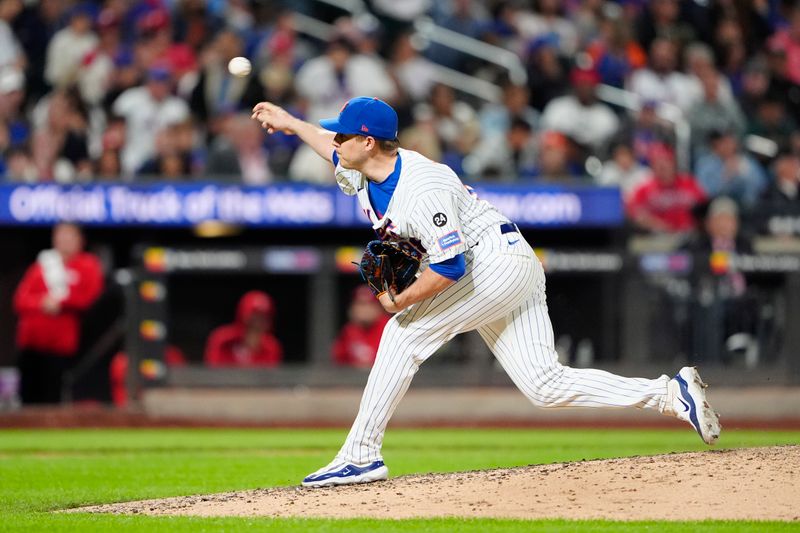 Sep 22, 2024; New York City, New York, USA; New York Mets pitcher Phil Maton (88) delivers a pitch against the Philadelphia Phillies during the fifth inning at Citi Field. Mandatory Credit: Gregory Fisher-Imagn Images