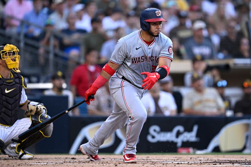 Jun 24, 2024; San Diego, California, USA; Washington Nationals catcher Keibert Ruiz (20) hits a double against the San Diego Padres during the second inning at Petco Park. Mandatory Credit: Orlando Ramirez-USA TODAY Sports