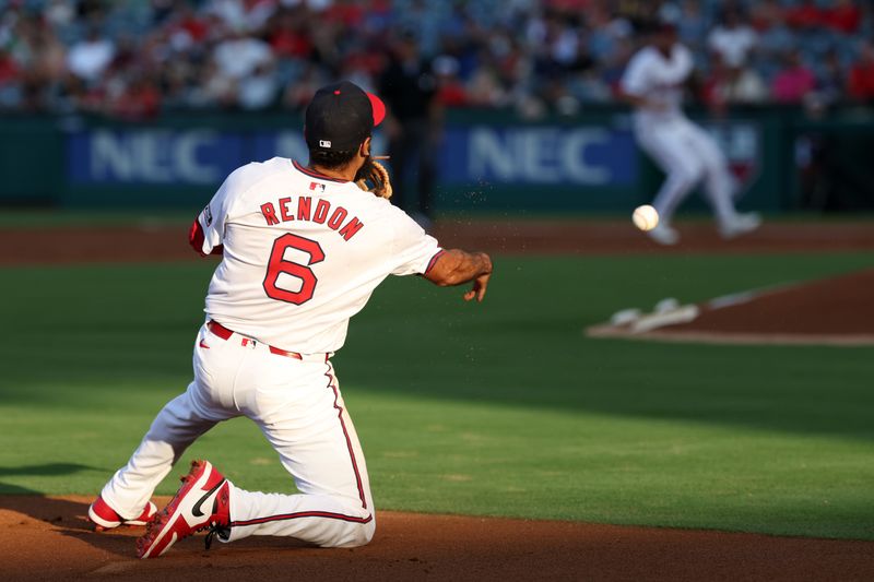 Jul 25, 2024; Anaheim, California, USA;  Los Angeles Angels third baseman Anthony Rendon (6) throws a ball to first base during the second inning against the Oakland Athletics at Angel Stadium. Mandatory Credit: Kiyoshi Mio-USA TODAY Sports