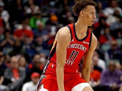 NEW ORLEANS, LOUISIANA - DECEMBER 23: Dyson Daniels #11 of the New Orleans Pelicans dribbles the ball down court during the first quarter of an NBA game against the Houston Rockets at Smoothie King Center on December 23, 2023 in New Orleans, Louisiana. NOTE TO USER: User expressly acknowledges and agrees that, by downloading and or using this photograph, User is consenting to the terms and conditions of the Getty Images License Agreement. (Photo by Sean Gardner/Getty Images)