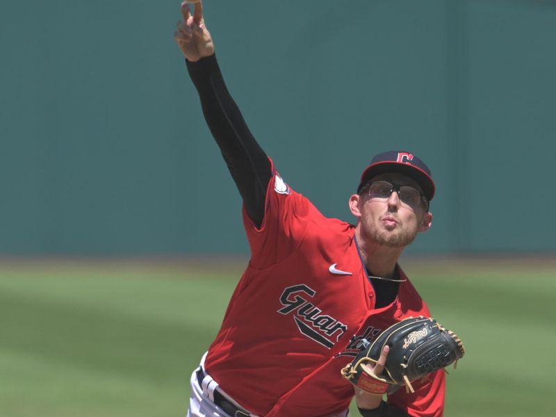 Apr 26, 2023; Cleveland, Ohio, USA; Cleveland Guardians starting pitcher Tanner Bibee (61) throws a pitch during the first inning against the Colorado Rockies at Progressive Field. Mandatory Credit: Ken Blaze-USA TODAY Sports