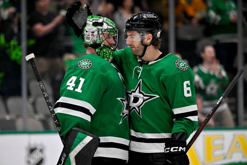 Apr 3, 2023; Dallas, Texas, USA; Dallas Stars defenseman Colin Miller (6) hugs goaltender Scott Wedgewood (41) after the victory over the Nashville Predators at the American Airlines Center. Mandatory Credit: Jerome Miron-USA TODAY Sports