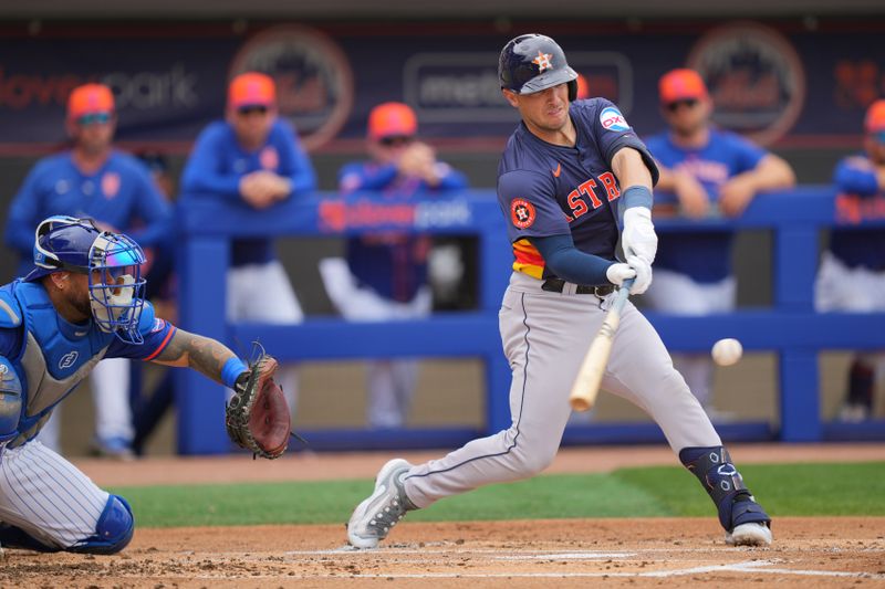 Mar 23, 2024; Port St. Lucie, Florida, USA;  Houston Astros third baseman Alex Bregman (2) hits a three-run home run in the first inning against the New York Mets at Clover Park. Mandatory Credit: Jim Rassol-USA TODAY Sports