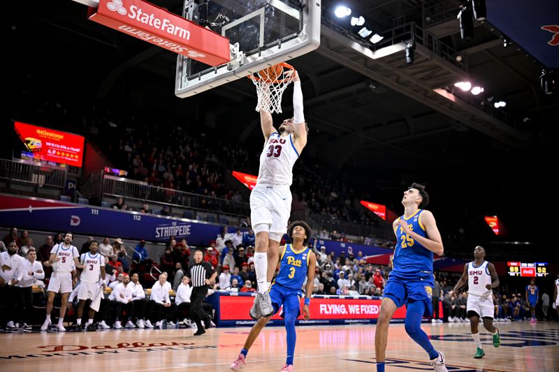 Feb 11, 2025; Dallas, Texas, USA; Southern Methodist Mustangs forward Matt Cross (33) dunks the ball against the Pittsburgh Panthers during the second half at Moody Coliseum. Mandatory Credit: Jerome Miron-Imagn Images