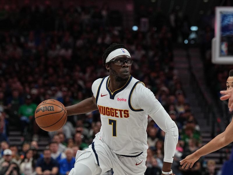 DALLAS, TX - MARCH 17: Reggie Jackson #7 of the Denver Nuggets handles the ball during the game against the Dallas Mavericks on March 17, 2024 at the American Airlines Center in Dallas, Texas. NOTE TO USER: User expressly acknowledges and agrees that, by downloading and or using this photograph, User is consenting to the terms and conditions of the Getty Images License Agreement. Mandatory Copyright Notice: Copyright 2024 NBAE (Photo by Glenn James/NBAE via Getty Images)