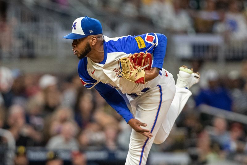 Sep 9, 2023; Cumberland, Georgia, USA; Atlanta Braves pitcher Darius Vines (64) pitches against Pittsburgh Pirates in sixth inning at Truist Park. Mandatory Credit: Jordan Godfree-USA TODAY Sports