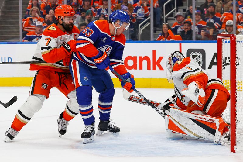 Jan 3, 2025; Edmonton, Alberta, CAN; Anaheim Ducks goaltender Lucas Dostal (1) makes a save on Edmonton Oilers forward Jeff Skinner (53) during the third period at Rogers Place. Mandatory Credit: Perry Nelson-Imagn Images