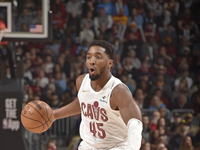 CLEVELAND, OH - JANUARY 8: Donovan Mitchell #45 of the Cleveland Cavaliers dribbles the ball during the game against the Oklahoma City Thunder on January 8, 2025 at Rocket Mortgage FieldHouse in Cleveland, Ohio. NOTE TO USER: User expressly acknowledges and agrees that, by downloading and/or using this Photograph, user is consenting to the terms and conditions of the Getty Images License Agreement. Mandatory Copyright Notice: Copyright 2025 NBAE (Photo by David Liam Kyle/NBAE via Getty Images)