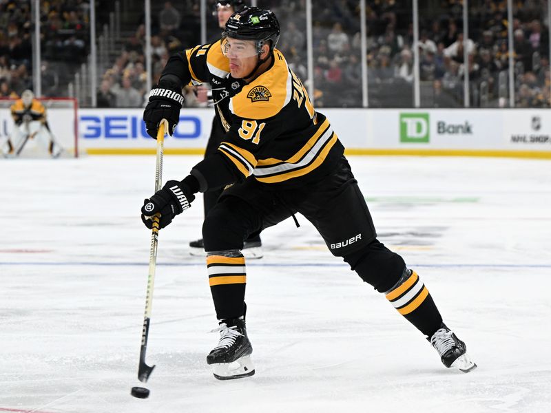 Oct 1, 2024; Boston, Massachusetts, USA; Boston Bruins defenseman Nikita Zadorov (91) takes a shot against the Philadelphia Flyers during the first period at the TD Garden. Mandatory Credit: Brian Fluharty-Imagn Images