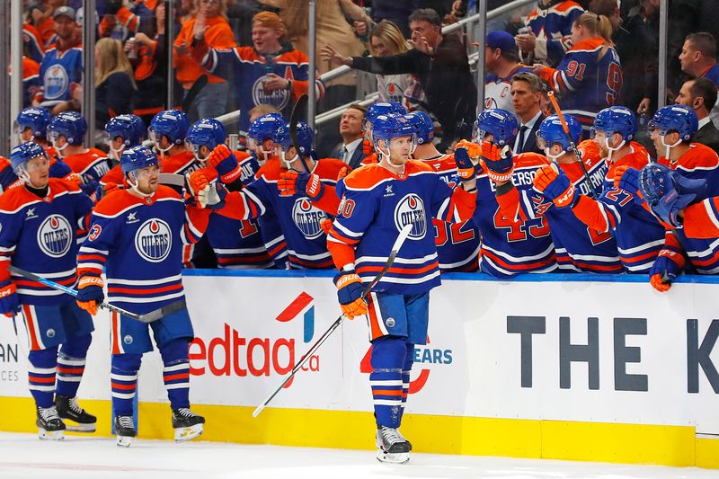 Oct 12, 2024; Edmonton, Alberta, CAN; The Edmonton Oilers celebrate a goal scored by forward Corey Perry (90) during the second period against the Chicago Blackhawks at Rogers Place. Mandatory Credit: Perry Nelson-Imagn Images