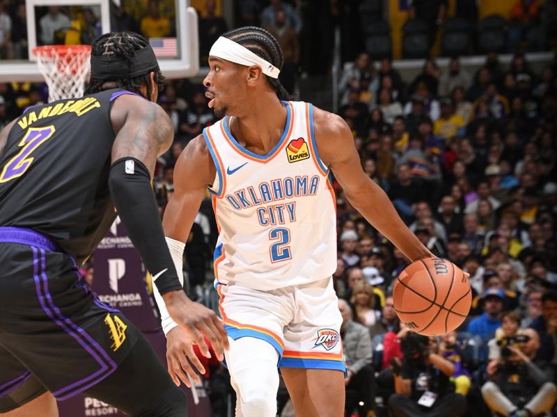 LOS ANGELES, CA - JANUARY 15:  Shai Gilgeous-Alexander #2 of the Oklahoma City Thunder handles the ball during the game  on January 15, 2024 at Crypto.Com Arena in Los Angeles, California. NOTE TO USER: User expressly acknowledges and agrees that, by downloading and/or using this Photograph, user is consenting to the terms and conditions of the Getty Images License Agreement. Mandatory Copyright Notice: Copyright 2024 NBAE (Photo by Andrew D. Bernstein/NBAE via Getty Images)