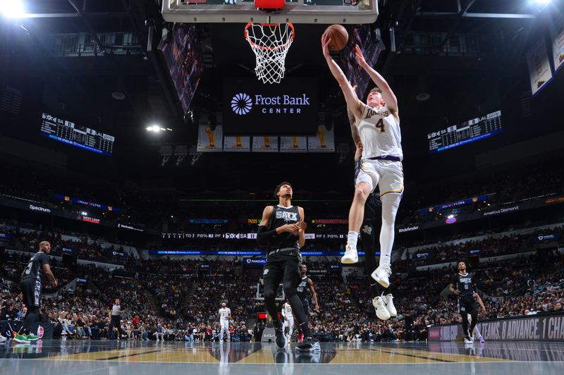 SAN ANTONIO, TX - OCTOBER 22:  Dalton Knecht #4 of the Los Angeles Lakers shoots the ball during the NBA Cup game against the San Antonio Spurs on October 22, 2024 at the Frost Bank Center in San Antonio, Texas. NOTE TO USER: User expressly acknowledges and agrees that, by downloading and or using this photograph, user is consenting to the terms and conditions of the Getty Images License Agreement. Mandatory Copyright Notice: Copyright 2024 NBAE (Photos by Michael Gonzales/NBAE via Getty Images)