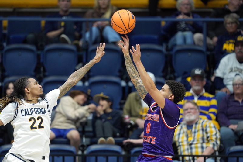 Dec 13, 2025; Berkeley, California, USA; Northwestern State Demons guard Izzy Miles (0) shoots against California Golden Bears forward Chris Bell (22) during the first half at Haas Pavilion. Mandatory Credit: Darren Yamashita-Imagn Images