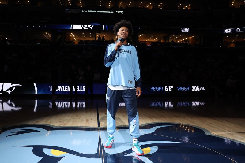 MEMPHIS, TN - OCTOBER 30: Jaylen Wells #0 of the Memphis Grizzlies talks to the fans before the game against the Brooklyn Nets on October 30, 2024 at FedExForum in Memphis, Tennessee. NOTE TO USER: User expressly acknowledges and agrees that, by downloading and or using this photograph, User is consenting to the terms and conditions of the Getty Images License Agreement. Mandatory Copyright Notice: Copyright 2024 NBAE (Photo by Joe Murphy/NBAE via Getty Images)