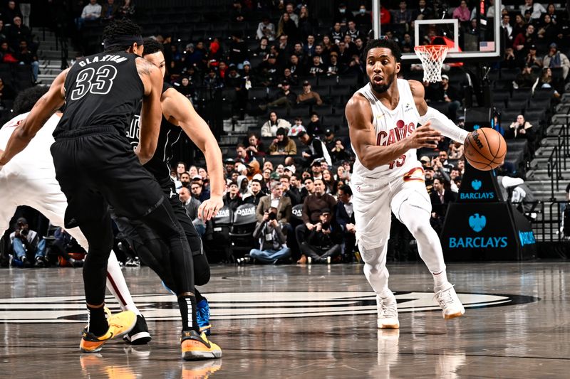 BROOKLYN, NY - FEBRUARY 8: Donovan Mitchell #45 of the Cleveland Cavaliers dribbles the ball during the game against the Brooklyn Nets on February 8, 2024 at the Barclays Center in Brooklyn, New York. NOTE TO USER: User expressly acknowledges and agrees that, by downloading and/or using this Photograph, user is consenting to the terms and conditions of the Getty Images License Agreement. Mandatory Copyright Notice: Copyright 2024 NBAE (Photo by David Dow/NBAE via Getty Images)