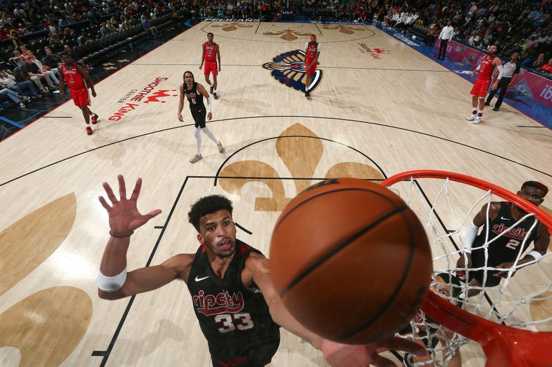 NEW ORLEANS, LA - MARCH 16: Toumani Camara #33 of the Portland Trail Blazers rebounds the ball during the game against the New Orleans Pelicans on March 16, 2024 at the Smoothie King Center in New Orleans, Louisiana. NOTE TO USER: User expressly acknowledges and agrees that, by downloading and or using this Photograph, user is consenting to the terms and conditions of the Getty Images License Agreement. Mandatory Copyright Notice: Copyright 2024 NBAE (Photo by Layne Murdoch Jr./NBAE via Getty Images)