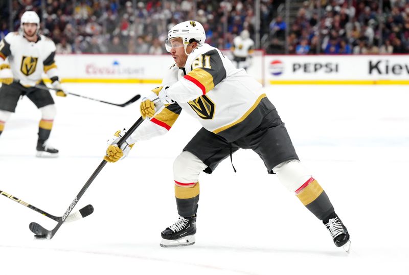 Jan 10, 2024; Denver, Colorado, USA; Vegas Golden Knights right wing Jonathan Marchessault (81) shoots the puck in the first period against the Colorado Avalanche at Ball Arena. Mandatory Credit: Ron Chenoy-USA TODAY Sports