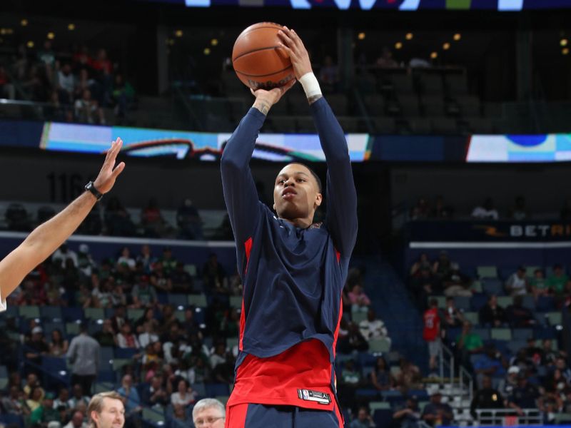 NEW ORLEANS, LA - MARCH 30: Jordan Hawkins #24 of the New Orleans Pelicans warms up before the game against the Boston Celtics on March 30, 2024 at the Smoothie King Center in New Orleans, Louisiana. NOTE TO USER: User expressly acknowledges and agrees that, by downloading and or using this Photograph, user is consenting to the terms and conditions of the Getty Images License Agreement. Mandatory Copyright Notice: Copyright 2024 NBAE (Photo by Layne Murdoch Jr./NBAE via Getty Images)