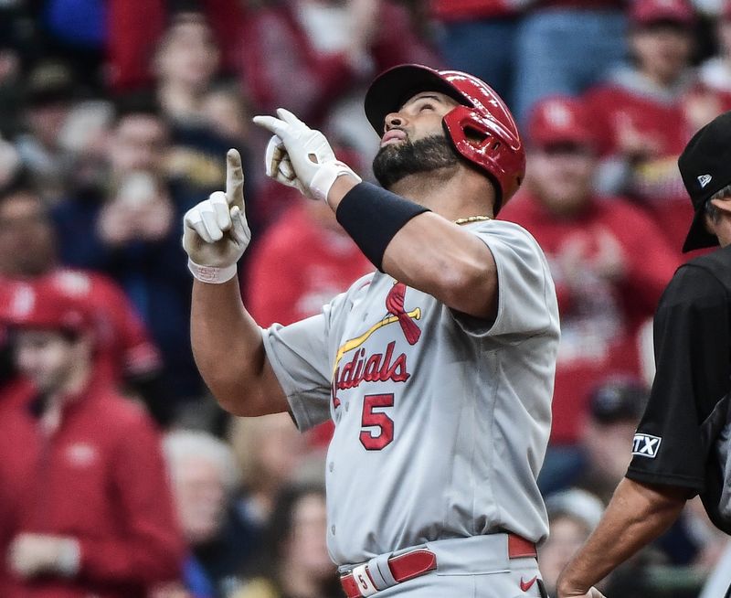 Apr 17, 2022; Milwaukee, Wisconsin, USA;  St. Louis Cardinals designated hitter Albert Pujols (5) reacts after hitting a 3-run homer in the third inning against the Milwaukee Brewers at American Family Field. Mandatory Credit: Benny Sieu-USA TODAY Sports