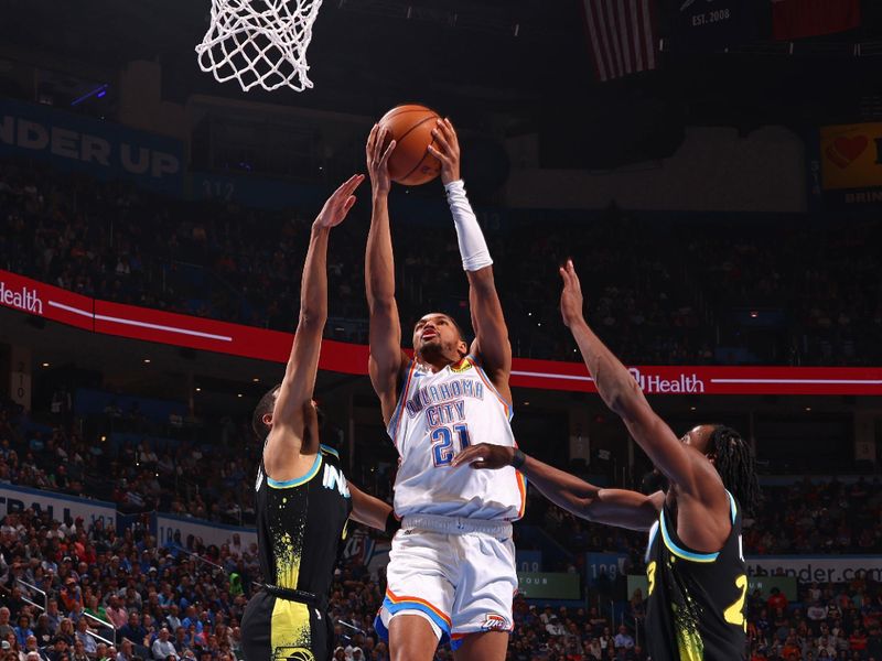 OKLAHOMA CITY, OK - MARCH 12: Aaron Wiggins #21 of the Oklahoma City Thunder drives to the basket during the game against the Indiana Pacers on March 12, 2024 at Paycom Arena in Oklahoma City, Oklahoma. NOTE TO USER: User expressly acknowledges and agrees that, by downloading and or using this photograph, User is consenting to the terms and conditions of the Getty Images License Agreement. Mandatory Copyright Notice: Copyright 2024 NBAE (Photo by Zach Beeker/NBAE via Getty Images)