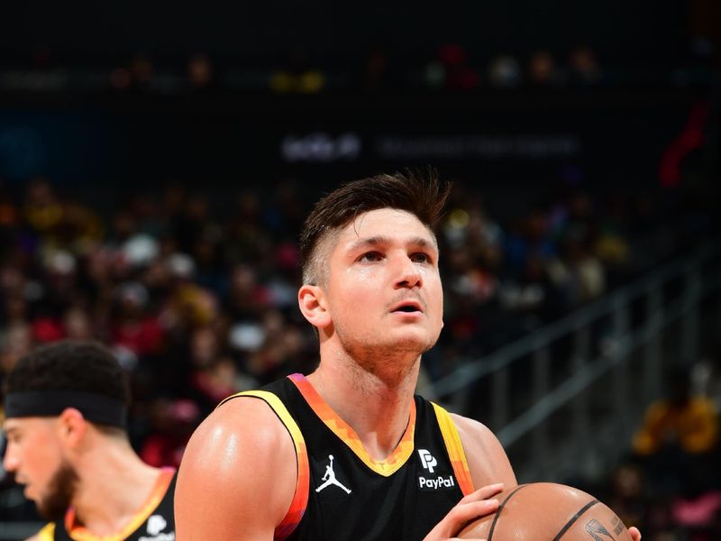 ATLANTA, GA - FEBRUARY 2: Grayson Allen #8 of the Phoenix Suns shoots a free throw during the game against the Atlanta Hawks on February 2, 2024 at State Farm Arena in Atlanta, Georgia.  NOTE TO USER: User expressly acknowledges and agrees that, by downloading and/or using this Photograph, user is consenting to the terms and conditions of the Getty Images License Agreement. Mandatory Copyright Notice: Copyright 2024 NBAE (Photo by Scott Cunningham/NBAE via Getty Images)