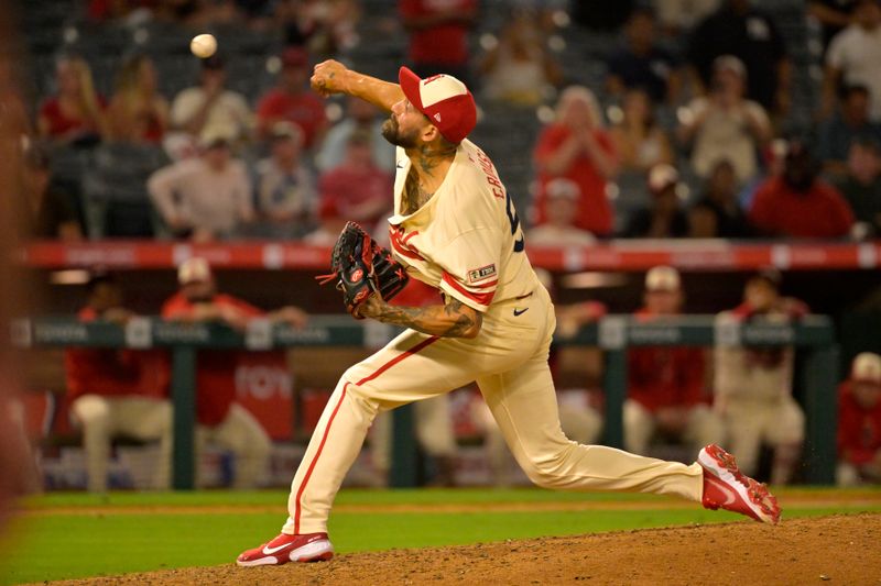 Jun 24, 2024; Anaheim, California, USA;  Los Angeles Angels relief pitcher Hans Crouse (52) delivers to the plate in the ninth inning against the Oakland Athletics at Angel Stadium. Mandatory Credit: Jayne Kamin-Oncea-USA TODAY Sports