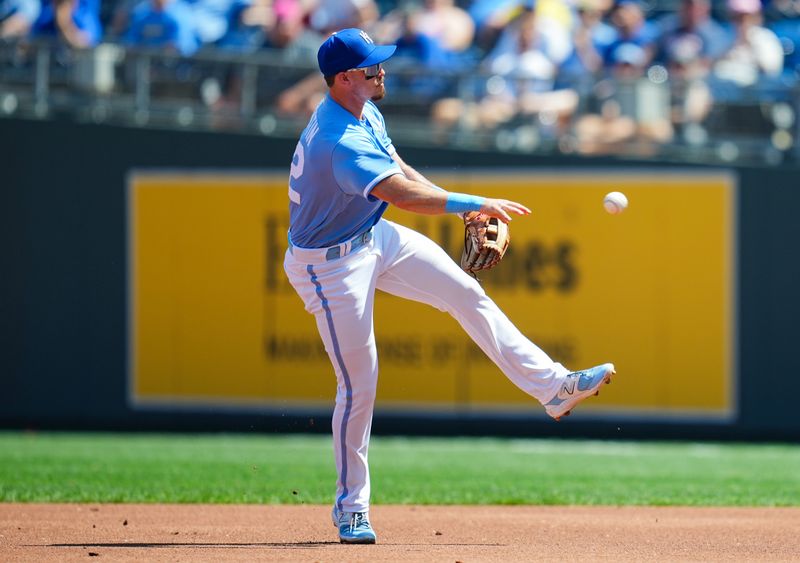 Sep 3, 2023; Kansas City, Missouri, USA; Kansas City Royals second baseman Nick Loftin (12) throws to first base during the second inning against the Boston Red Sox at Kauffman Stadium. Mandatory Credit: Jay Biggerstaff-USA TODAY Sports