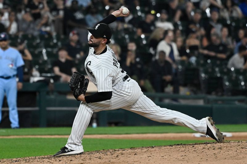 Jul 6, 2023; Chicago, Illinois, USA; Chicago White Sox relief pitcher Nicholas Padilla (61) delivers against the Toronto Blue Jays during the seventh inning  at Guaranteed Rate Field. Mandatory Credit: Matt Marton-USA TODAY Sports