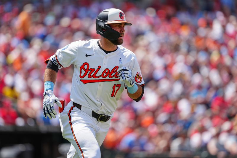 Jun 16, 2024; Baltimore, Maryland, USA; Baltimore Orioles left fielder Colton Cowser (17) runs out a single against the Philadelphia Phillies during the fifth inning at Oriole Park at Camden Yards. Mandatory Credit: Gregory Fisher-USA TODAY Sports