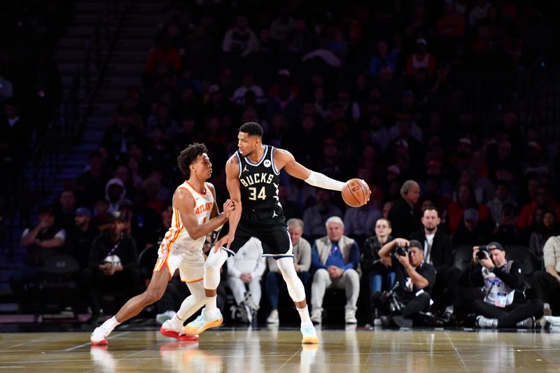 LAS VEGAS, NV - DECEMBER 14: Giannis Antetokounmpo #34 of the Milwaukee Bucks handles the ball during the game against the Atlanta Hawks during the Emirates NBA Cup Eastern Semifinals on December 14, 2024 at the T-Mobile Arena in Las Vegas, Nevada. NOTE TO USER: User expressly acknowledges and agrees that, by downloading and or using this photograph, User is consenting to the terms and conditions of the Getty Images License Agreement. Mandatory Copyright Notice: Copyright 2024 NBAE (Photo by Logan Riely/NBAE via Getty Images)