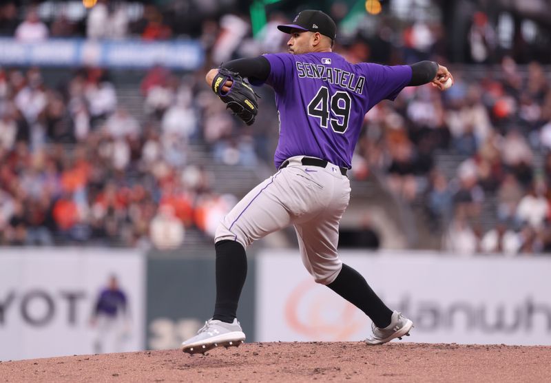 May 2, 2025; San Francisco, California, USA; Colorado Rockies starting pitcher Antonio Senzatela (49) pitches the ball against the San Francisco Giants during the first inning at Oracle Park. Mandatory Credit: Kelley L Cox-Imagn Images