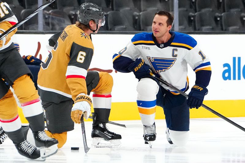 Oct 11, 2024; Las Vegas, Nevada, USA; Vegas Golden Knights defenseman Kaedan Korczak (6) talks with St. Louis Blues center Brayden Schenn (10) before the start of a game at T-Mobile Arena. Mandatory Credit: Stephen R. Sylvanie-Imagn Images